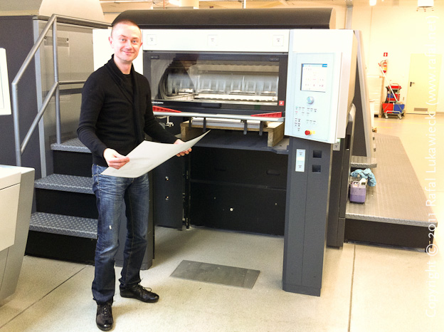 Proudly Holding a Test Run Sheet at the Back of a Heidelberg Speedmaster